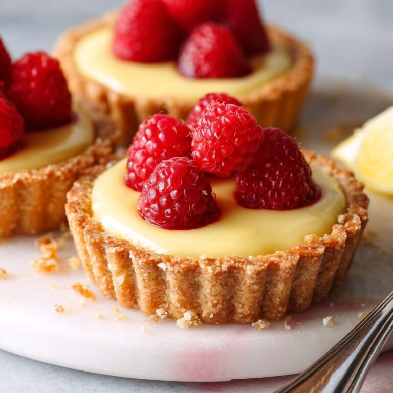 Mini Lemon Tarts with Raspberry Jam and Fresh Raspberries Recipe